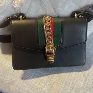 Gucci navy shoulder bag with gold chain trim